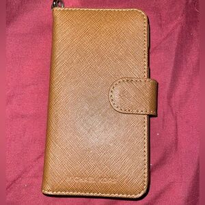Used!!! Michael Kors phone wallet, iPhone 6 and tan color
